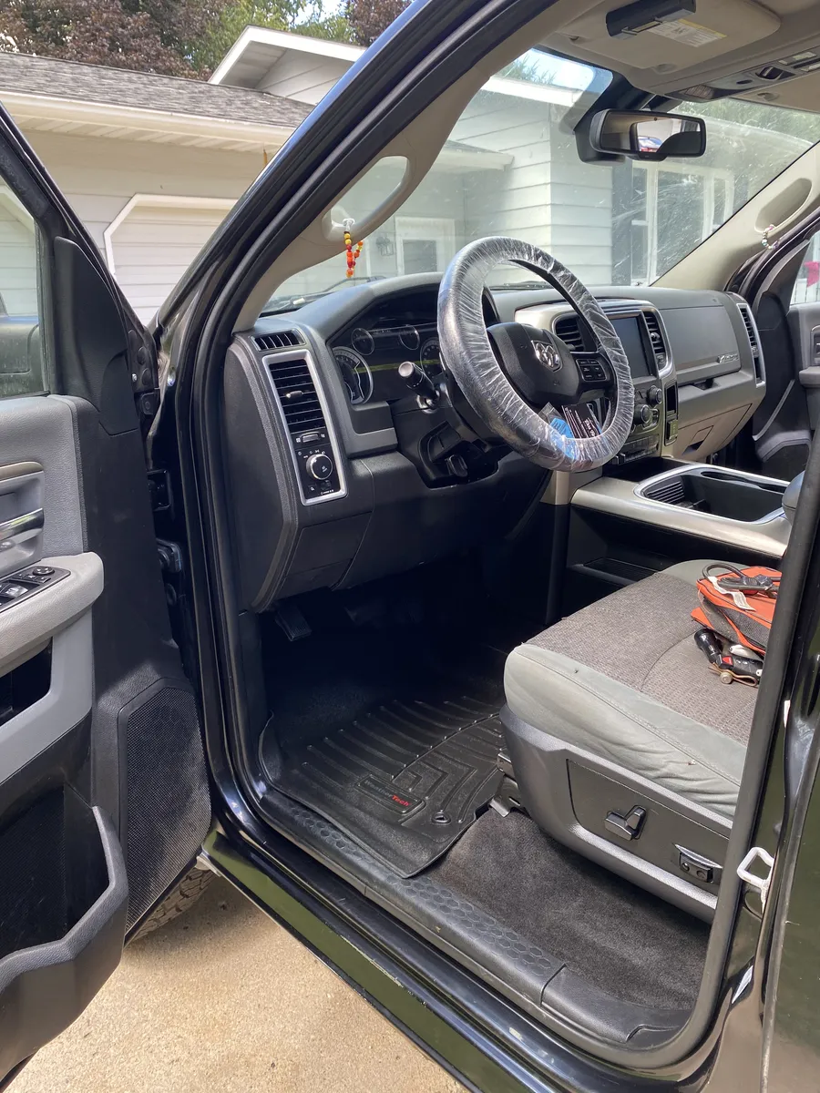 Car interior detail cleaning including dashboard and console in Morris