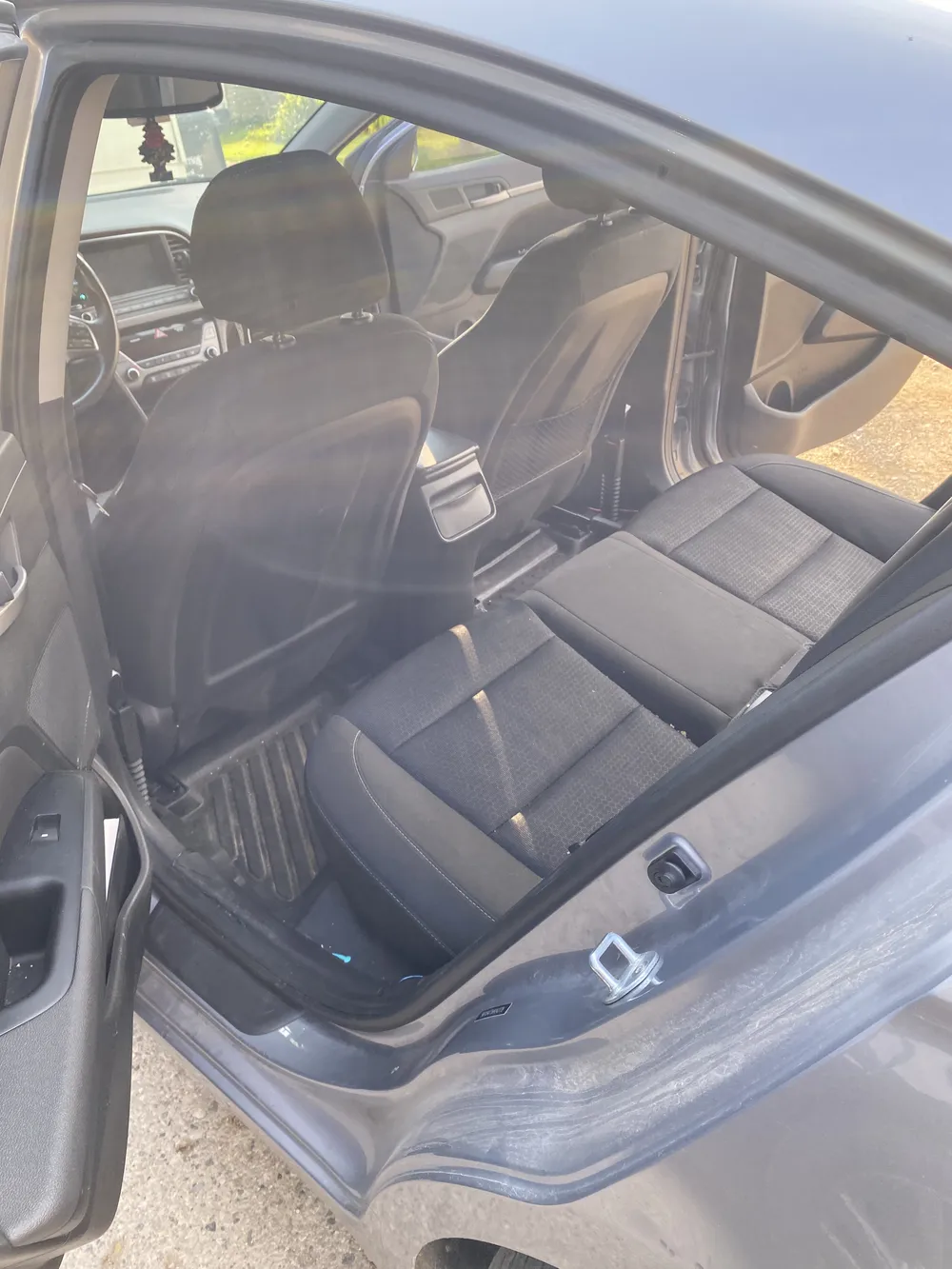 Professional paint correction detailing on a sedan in Morris, MN